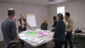 Don Barger, southeast regional director for National Parks Conservation Association from 1992 to 2019, hired Jeff Hunter in 2015 to work with multiple federal and state agencies and with regional conservation allies to preserve wildlife connectivity in the Southern Appalachian region. Barger is shown here leading a small group discussion at a 2018 stakeholder group meeting of the Pigeon River Gorge collaborative, which was later named Safe Passage. Provided by Frances Figart.