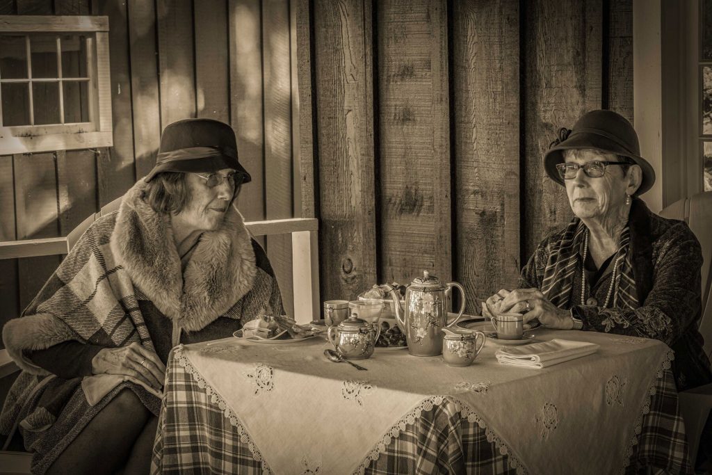 Volunteers from the Elkmont Roving Corps—a group of dedicated volunteers who help protect and interpret the Elkmont Historic District—adopted one of the Daisy Town cabins and chose a theme for their stop along the event. These ladies dressed in 1920s attire hosted a tea party. Photo by Paul Driessche.