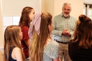 Jeff Hunter of NPCA welcomed FernLeaf Community Charter School students Joy Mast, Elsa Rule, and Cailee Montague to a June 2 meeting with North Carolina Governor Roy Cooper at the Western Office of the NC Department of Natural and Cultural Resources in Asheville. The students had completed a study module about road ecology—including touring the Pigeon River Gorge and reading the chapter book A Search for Safe Passage published by Great Smoky Mountains Association—and came to represent their class and to deliver wildlife advocacy letters to the governor. Provided by Jerry Greer, courtesy NPCA.