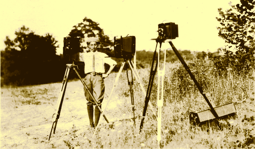 George Masa working with several cameras that represented state-of-the-art photographic technology in the early 1920s. Courtesy of the North Carolina Collection, Pack Memorial Library, Asheville, NC.