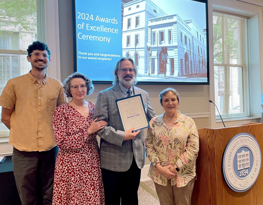 Michael Aday (second from right) recently received a 2024 Project Excellence Award from the East Tennessee Historical Society. Attending the ceremony with him were (from left) the book’s editorial assistant Aaron Searcy, Denise Aday, and Smokies Life CEO Laurel Rematore. Not pictured is the book’s editor, Frances Figart. Photo provided by Smokies Life.