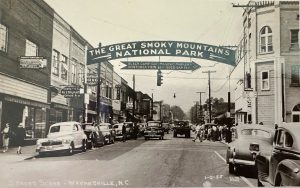 As shown in this 1955 photo, the words on the sign changed multiple times between its installation in 1933 and demolition in 1972, but “at all times it has given a word-picture of the area,” a former editor of The Mountaineer newspaper wrote in a 1972 editorial. Photo provided by Cline Photo, Downtown Waynesville Association.