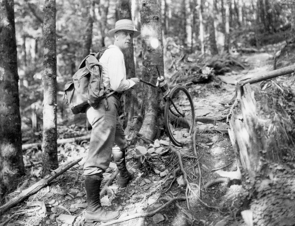 Knoxville photographer Jim Thompson measures a trail in the Great Smoky Mountains, likely during the 1930s. Photo provided by Thompson Photograph Collection, Calvin M. McClung Historical Collection, Knox County Public Library.