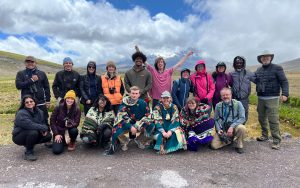 Students and other travelers pose inside Ecuador’s Antisana National Park near Antisana Volcano, the last stop on their Comparative Temperate–Tropical Ecology and Biogeography course trip. Photo by Travis Knowles.