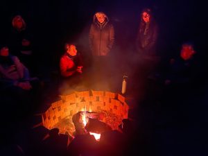 At night, Eco-Adventurers are invited to share stories around the campfire and participate in short walks in the moonlight, identifying bat species by sonar using special equipment and discovering creatures that fluoresce under UV light. Photo provided by DLiA. 