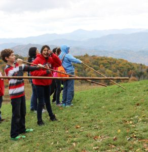 Students from Cherokee Middle School use blowguns during a field trip to Great Smoky Mountains National Park. Photo provided by Jessica Metz. 