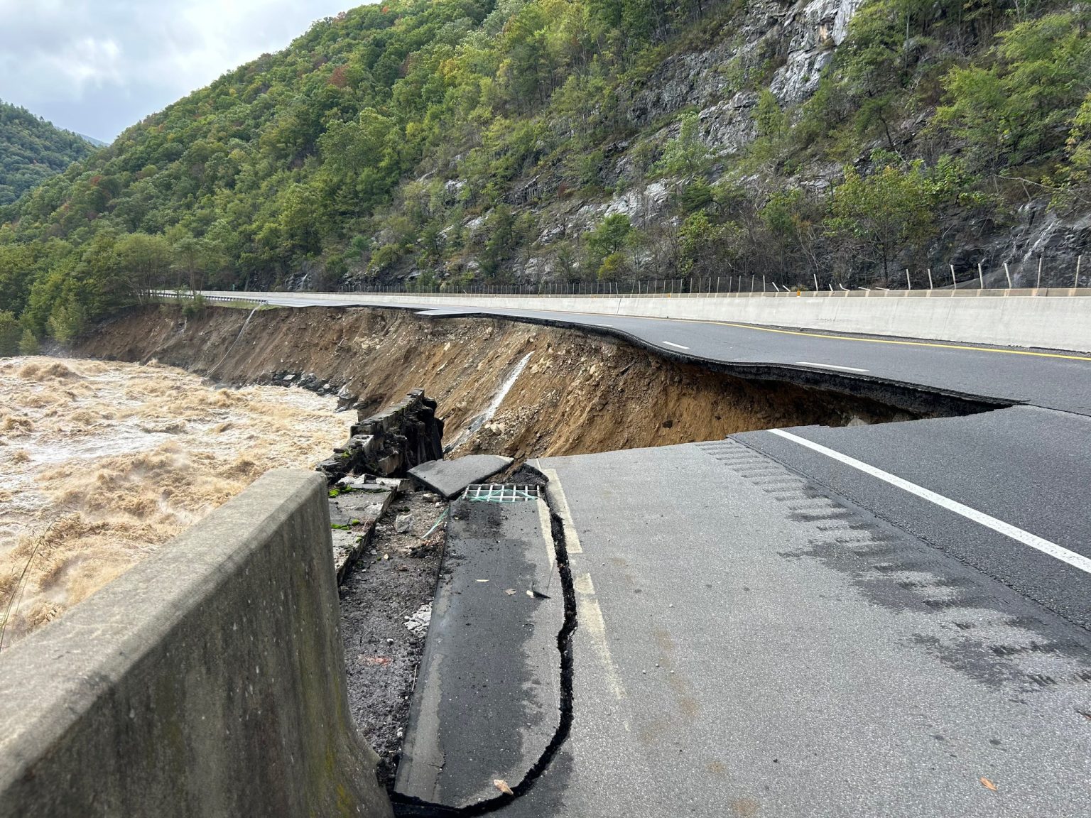 In the most-affected areas of I-40, entire lanes of highway were carried away, as was the soil on which they once rested. Photo provided by NCDOT.