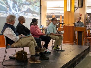 Poetry cohort leader Maurice Manning speaks during an October 26 panel discussion at the Blount County Public Library moderated by Jeremy Lloyd (far right), manager of field programs and collegiate studies for Tremont. Also participating in the panel were (from left) nonfiction cohort leader David Brill, guest author and poet Frank X Walker, and fiction cohort leader Monic Ductan. Photo provided by Valerie Polk. 