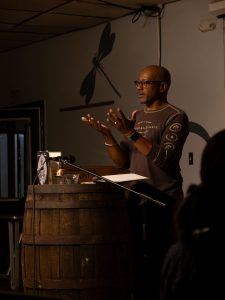 Poet and guest author Frank X Walker gives a poetry reading to Tremont Writers Conference attendees. Photo provided by Valerie Polk. 