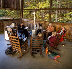 The 2024 Tremont Writers Conference poetry cohort gathers on an October morning to discuss the poems up for workshop that day. Photo by Valerie Polk, courtesy of Smokies Life. 