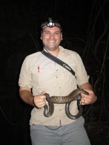 Shown here in Puerto Rico, Dr. R. Graham Reynolds specializes in reptiles and amphibians in the southern Appalachian Mountains, including hellbenders and high-elevation salamanders. He also studies lizards and snakes in the Caribbean, and occasionally works in more distant places like Vietnam and southern Mexico. Photo courtesy of Kristin Winchell. 