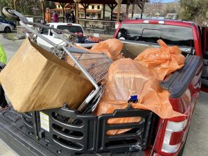 During a November 2024 cleanup in Swain County, 14 Swain Clean members collected 41 bags of trash, two tires, a deer skull, and a shopping cart. Photo by Cynthia Womble.
