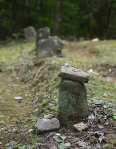 No names are etched in the stones marking gravesites at Enloe Cemetery, but the site is believed to be a burial ground for Black people enslaved by the Mingus family. Photo by Holly Kays, courtesy of Smokies Life.