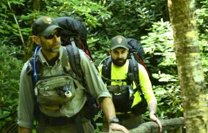 PSAR rangers like Joshua Albritton (left) and Cutter Wheeler typically concentrate their patrols on the first couple miles of busy trails and trailheads, but about twice each month they spend a day interacting with visitors even deeper in the backcountry. Photo by Holly Kays, courtesy of Smokies Life.