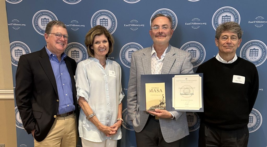 The East Tennessee Historical Society honored Masa’s biography with a 2025 Project Excellence Award through its Awards of Excellence program. Coauthor Paul Bonesteel is pictured with the award alongside Michael Searcy and Cheryl Light (left), parents of coeditor Aaron Searcy, and copy editor Ken Wise (right). Photo by Smokies Life.