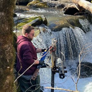 A member of the National Ecological Observation Network studies water quality in the Smokies. Photo courtesy of the National Park Service.