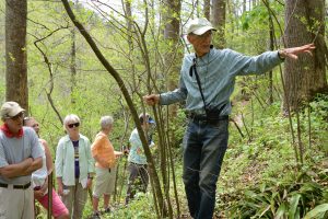 Dr. J. Dan Pittillo introduces visitors to the plants at Nodding Trillium Garden on the garden’s opening day in 2019. Photo by Holly Kays, courtesy of Smoky Mountain News.