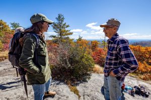 Dan Pittillo, a founding member of the Blue Ridge Bartram Trail Conservancy, enjoys the view from Scaly Mountain during a 2023 hiking trip led by the organization. Photo courtesy of the Blue Ridge Bartram Trail Conservancy.