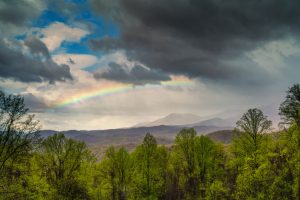 A rainbow spreads over the peaks of Great Smoky Mountains. Photo by Joye Ardyn Durham.