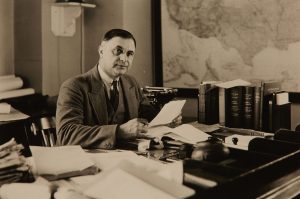 National Park Service Director Arno Cammerer works at his desk in Washington, DC, in 1936. Photo courtesy of the National Park Service.