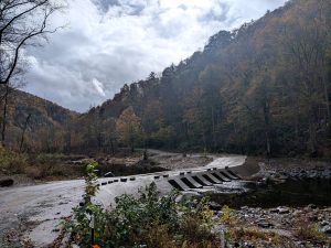 A low bridge crossing over a river