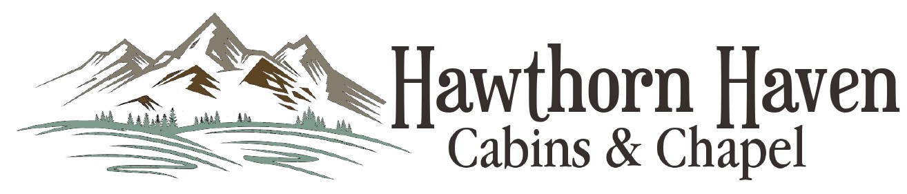 Logo for Hawthorn Haven Cabins and Chapel with illustrated mountains scene