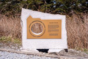 A granite and gold marker.