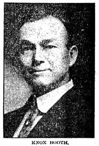 A pixelated black and white headshot of a man in a suit.