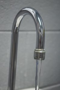 A faucet with running water