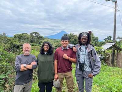 Deeya Khambhaita experiences Wildsumaco Biological Station in the Napo Province of Ecuador with Prof. Travis Knowles (left) and fellow Francis Marion University students Justin Bartolon and Jameel Montgomery (far right). Wildsumaco Volcano can be seen in the background. Photo by Travis Knowles.